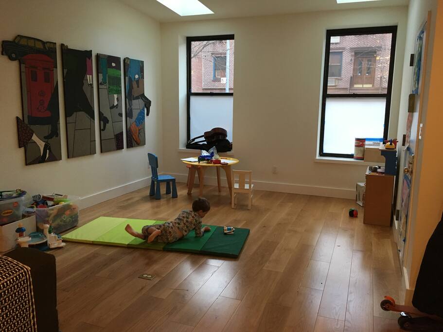 Large play area with lots of toys