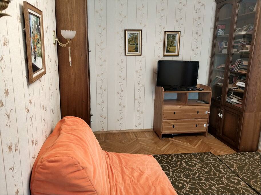 Living room, with chair-bed and TV set