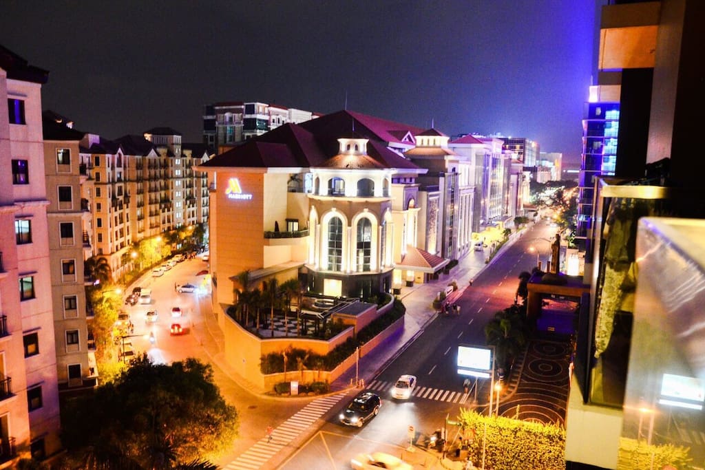 Night time by the balcony/ smoking area only in balcony.