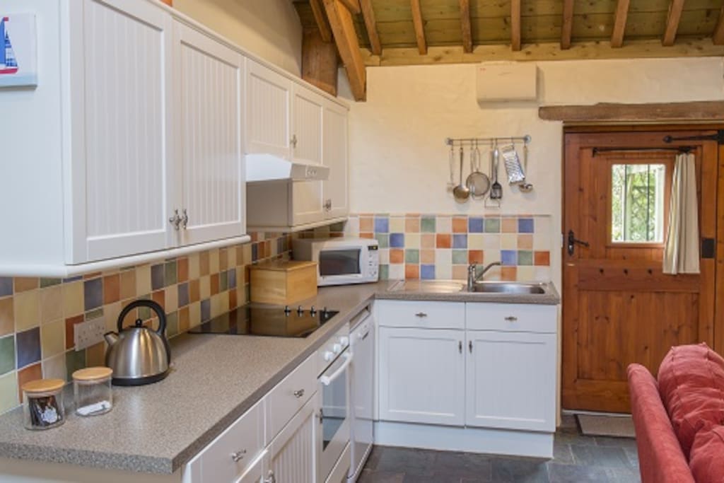 The kitchen is fully equipped including dishwasher