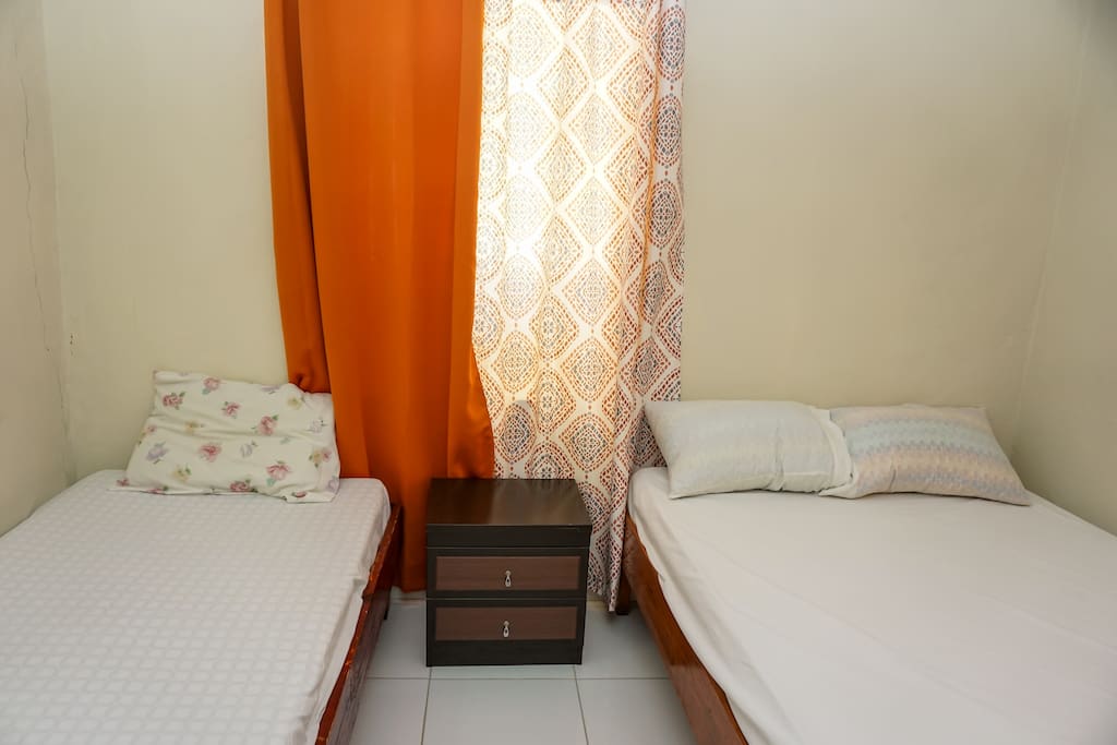 The triple room with one double bed and one single bed.