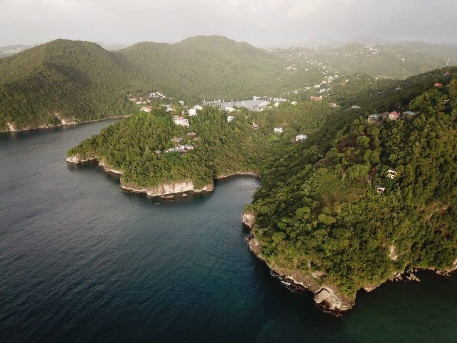 The Hummingbird Hangout is perched on the point to the right of the photo overlooking the sea. Marigot Bay can be seen behind. No one has views like the Hangout!