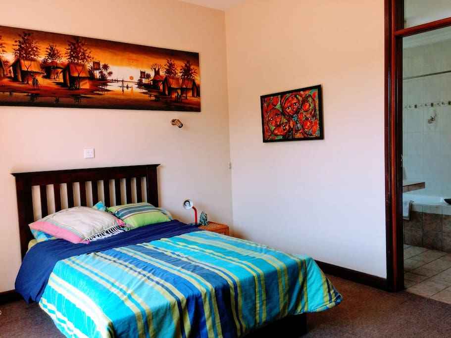 The first bedroom has a full mattress bed.