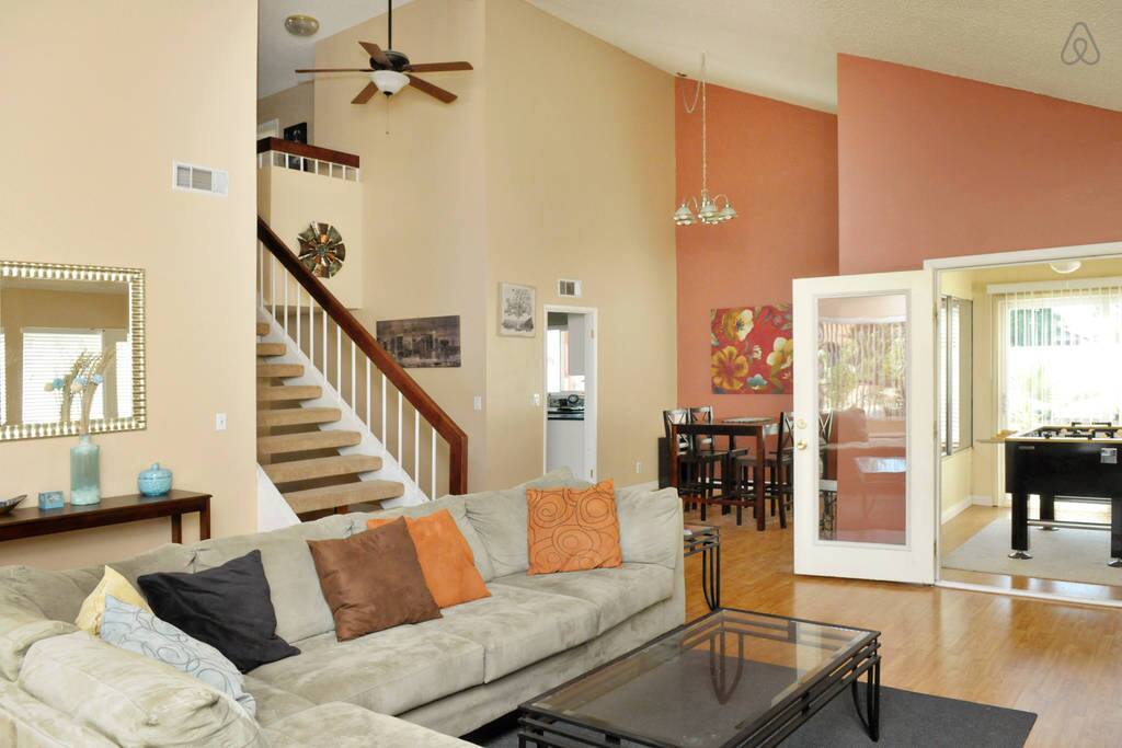 Very comfortable, 4-bedroom Vegas home that sleeps up to 14! Heated pool/spa, fully stocked kitchen, several rooms with Netflix/HDTVs/Cable, and so much more!