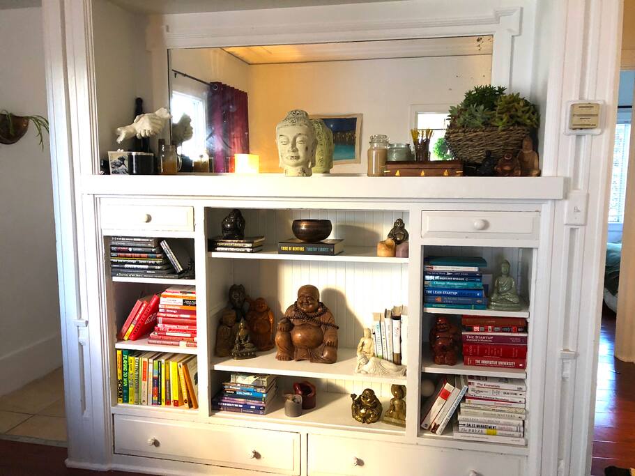 Lots of books available for guests, as well as more Buddha statues than you'll know what to do with.
