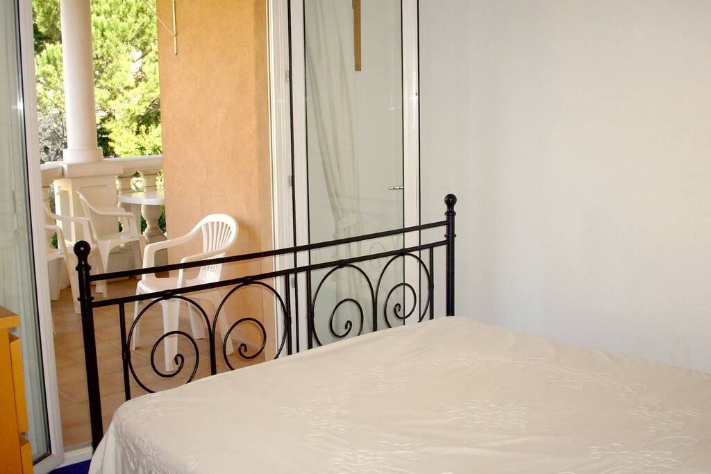 Main Bedroom overlooking main balcony.