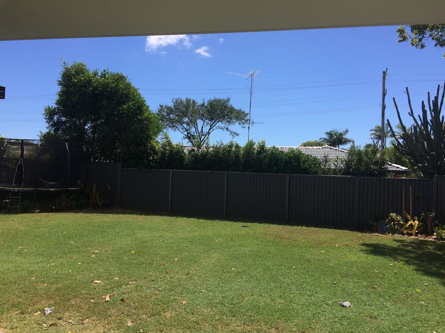 Fully fenced backyard. 15 foot trampoline.