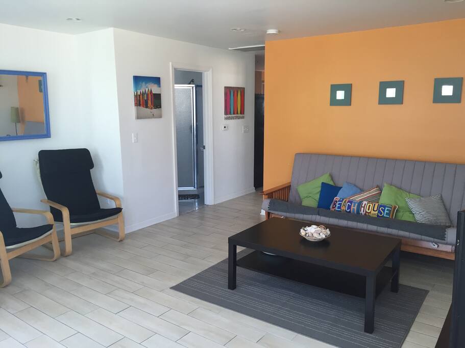 living room into hallway with futon