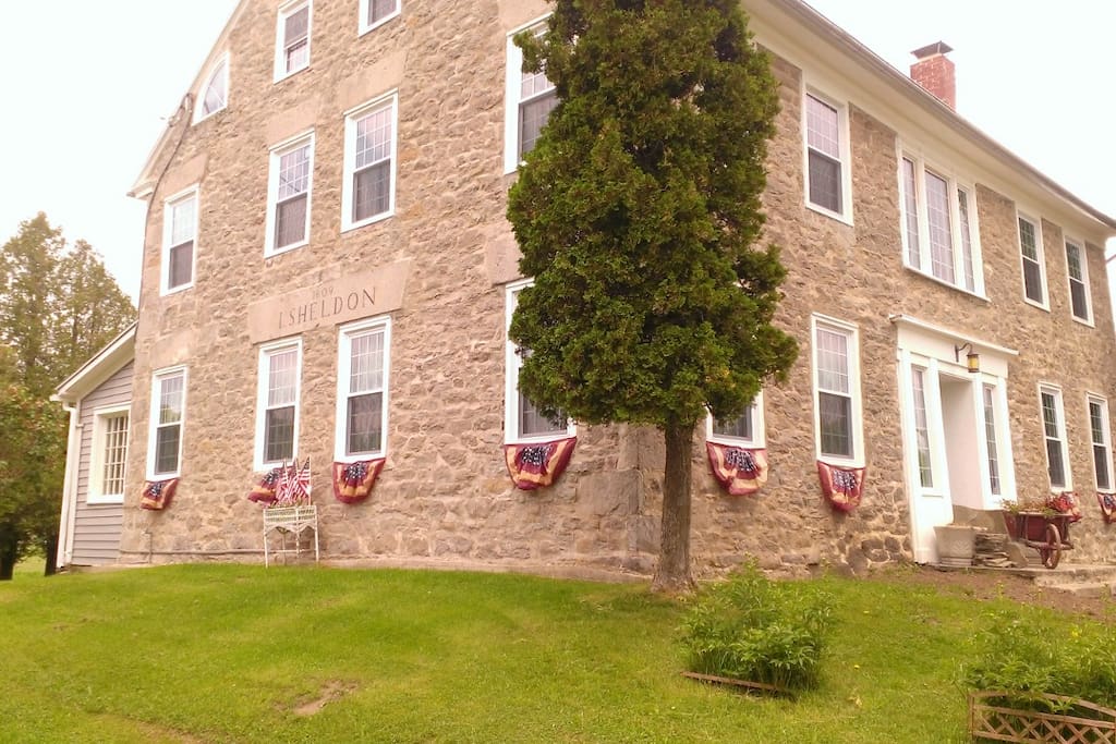 Thistle Dew is a historic stone house built on the old stage road in 1809 by J Sheldon. Located on 284 acres of field and forest this is a quiet country retreat in a picturesque setting.