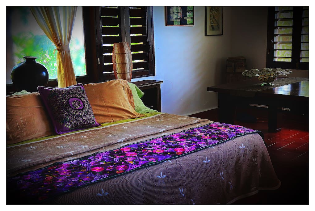 The master suite with a king size bed.