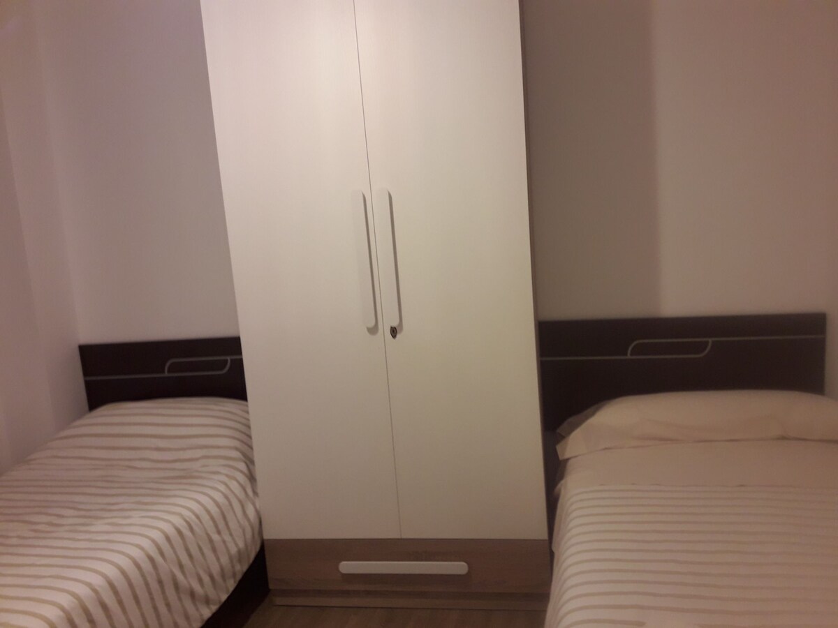 Dormitorio dos camas individuales