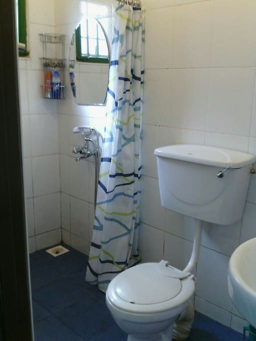 Bathroom with hot water shower.