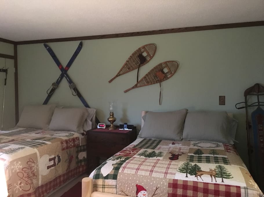 Two double beds with large closet to right