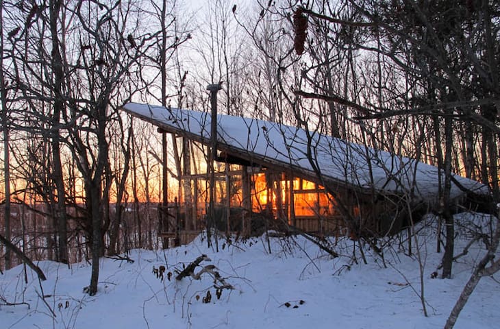 CABIN PERCHED on escarpment band
