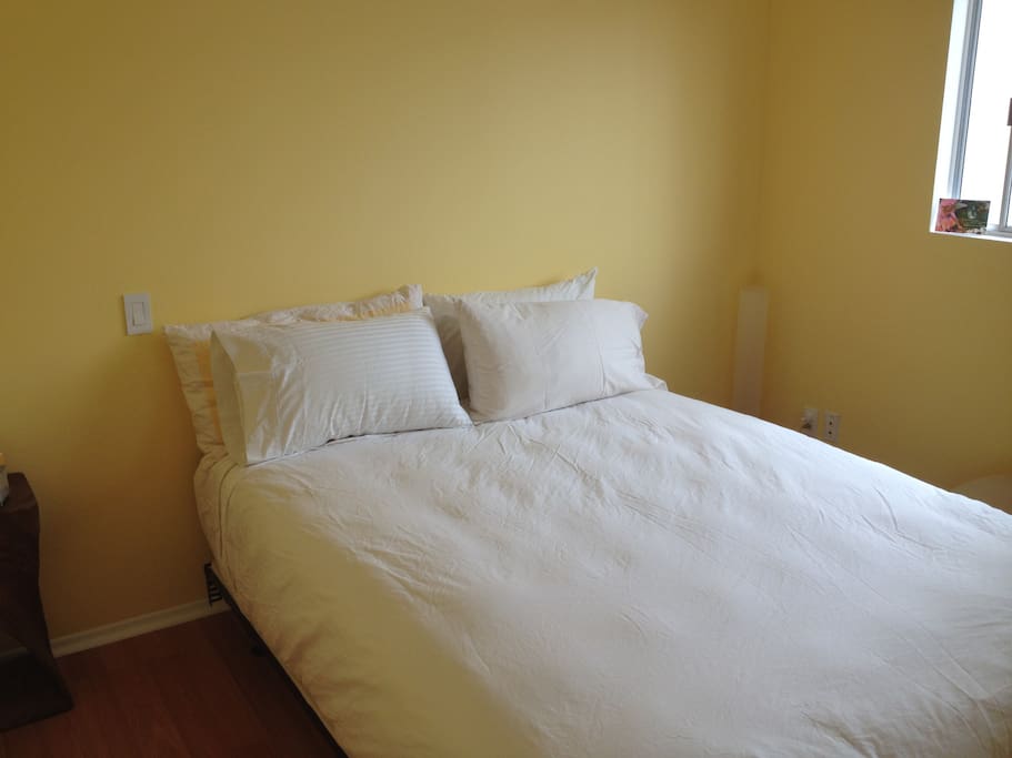 Peaceful bedroom - the sun is always shining!