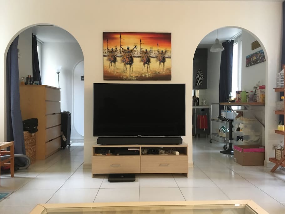 Bright living room with new TV