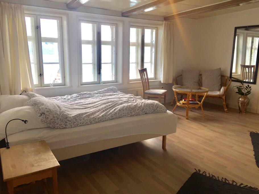 25sqm room with big double bed (180cm wide) and chill/work area. Extra baby or child's bed can be provided