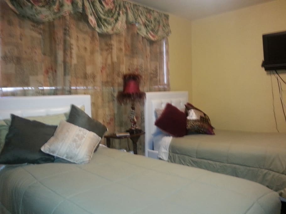 Twin beds 101 with black out shade