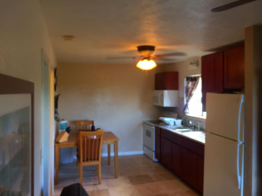 Granite counters, tile floors, full size appliances