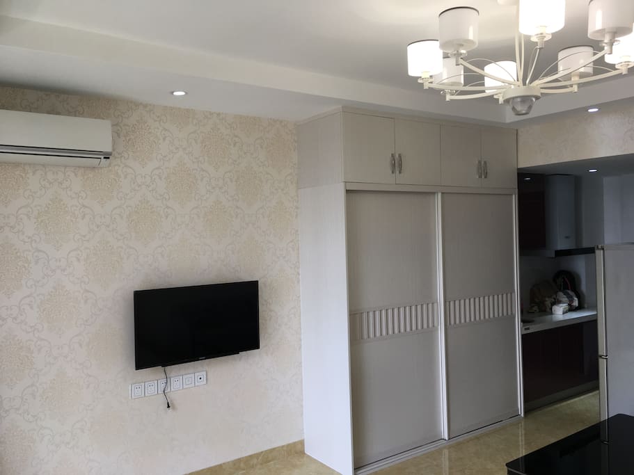 brand new television and air conditioner