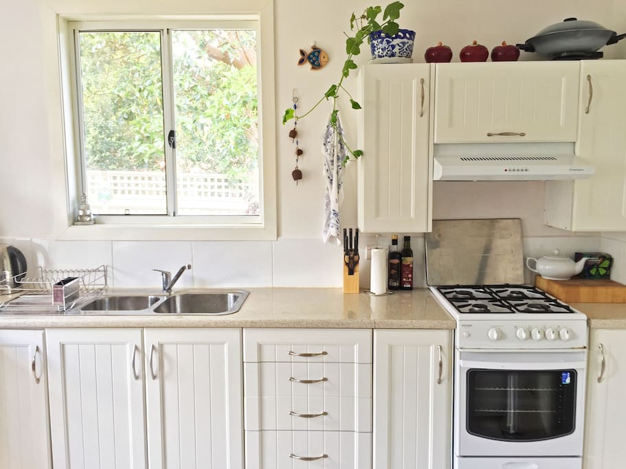 Fully equipped kitchen with cutlery, crockery, pots & pans, stovetop, oven and microwave. Help yourself to all the tea and coffee in the cupboard!