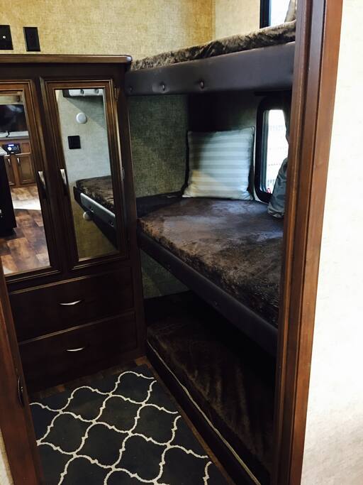 Bunk Room with four bunks and closet