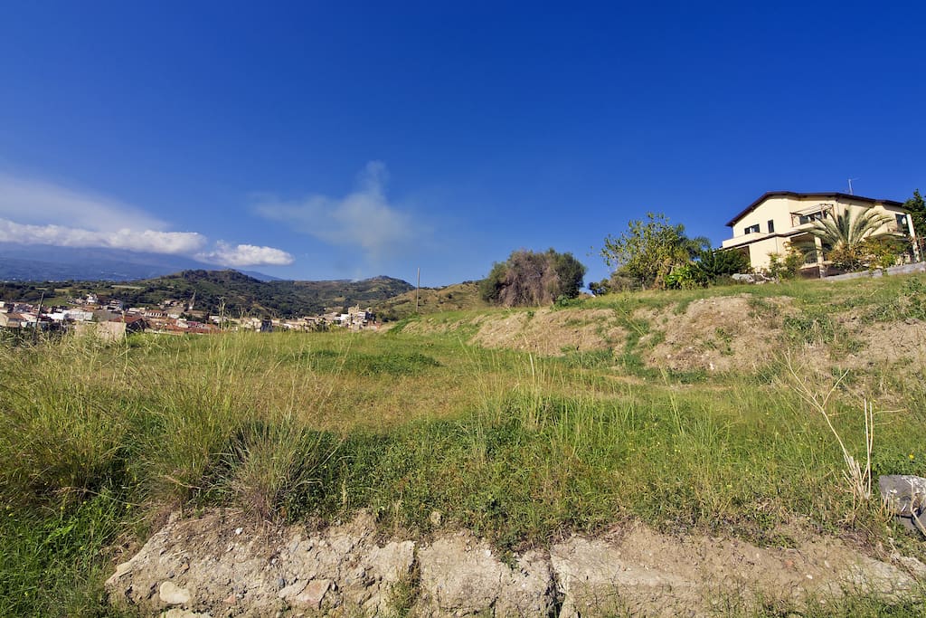 Apartment in Villa in Calatabiano. Panoramic Taormina and Etna View. A few minutes away from GIARDINI NOXOS and 10min far from TAORMINA CENTER. Etna & Vinery are reachable in a overage of 20min by car . . More info SunTripSicily.com