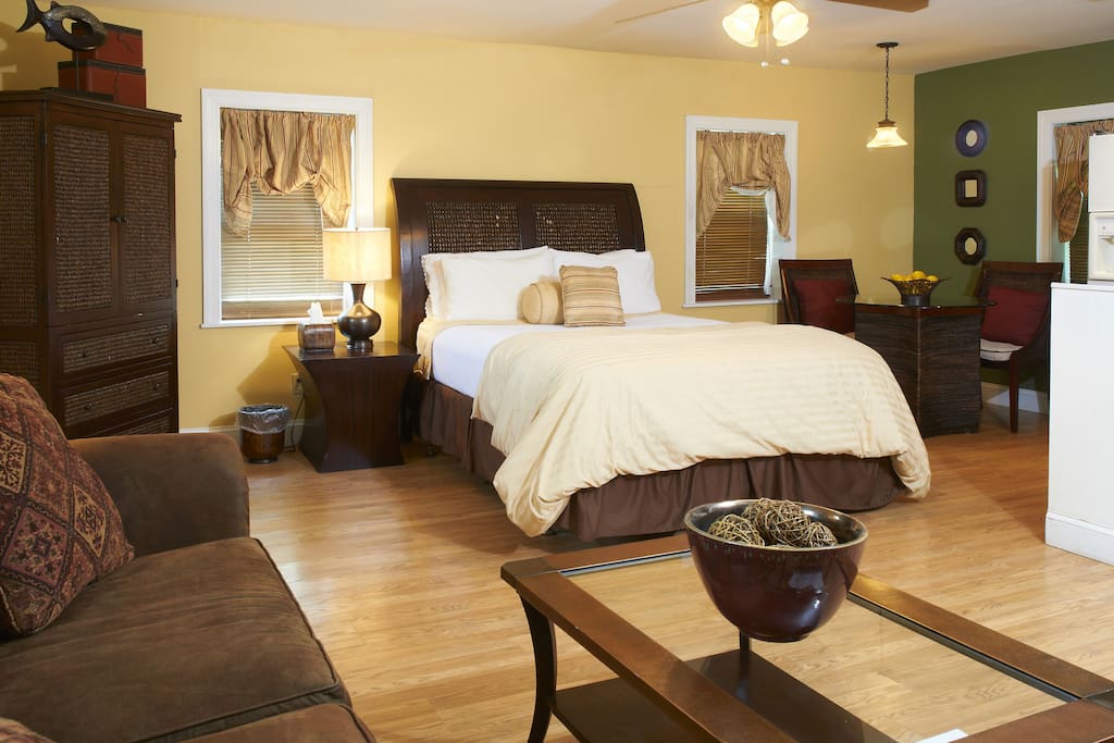 First floor w/ kitchen, queen bed, living area (sofa opens to queen bed) & bath