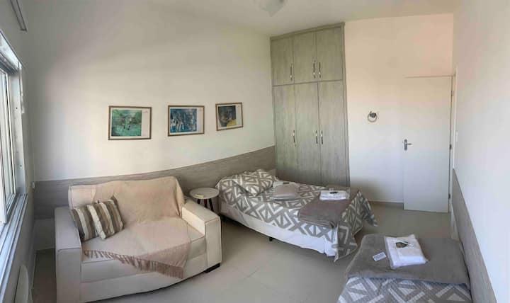 Room for 4 people, with two single beds and 2 more assistants, one sofa, closet with 2 doors available with clothes rack and drawers for clothing allocation, ceiling fan and air conditioner!
