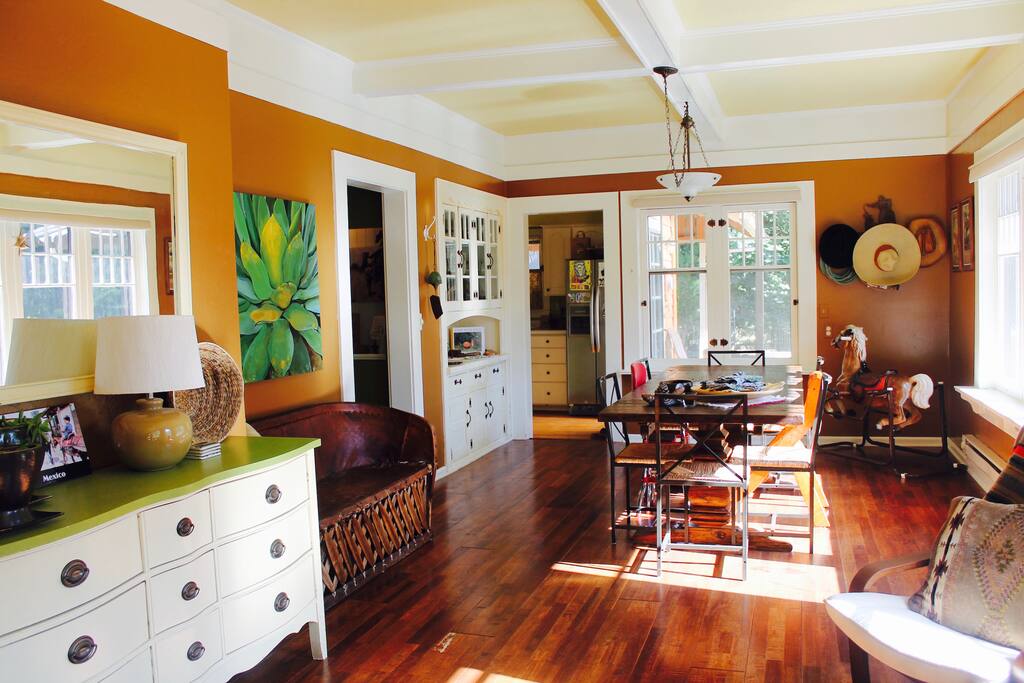 A view of the dining table & the entryway into the kitchen.