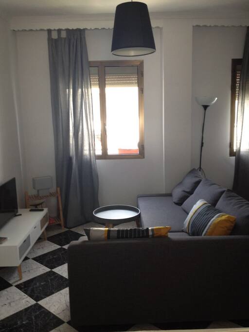 Salón con sofá cama doble