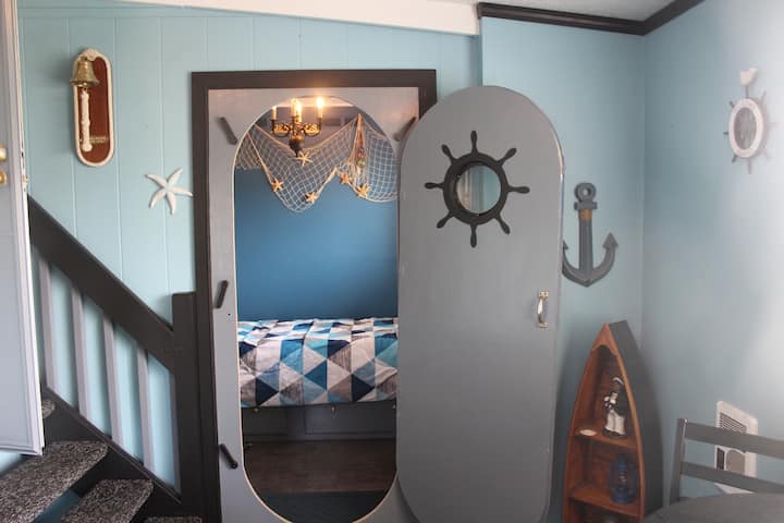Bedroom 3 - The Captain's Room -Twin Memory Foam Bed. Kids Love This "Very Tiny" Nautical Bedroom.  Several Board Games Are Located In This Room.