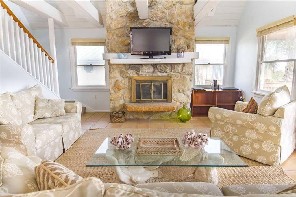 Gather in the lovely living room for movie night! - Pop a few bowls of popcorn, put a movie in, and settle into our generously st