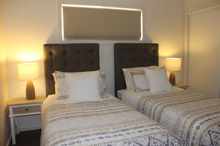 Bedroom 2, can be 2 long single beds or zipped into a large king bed