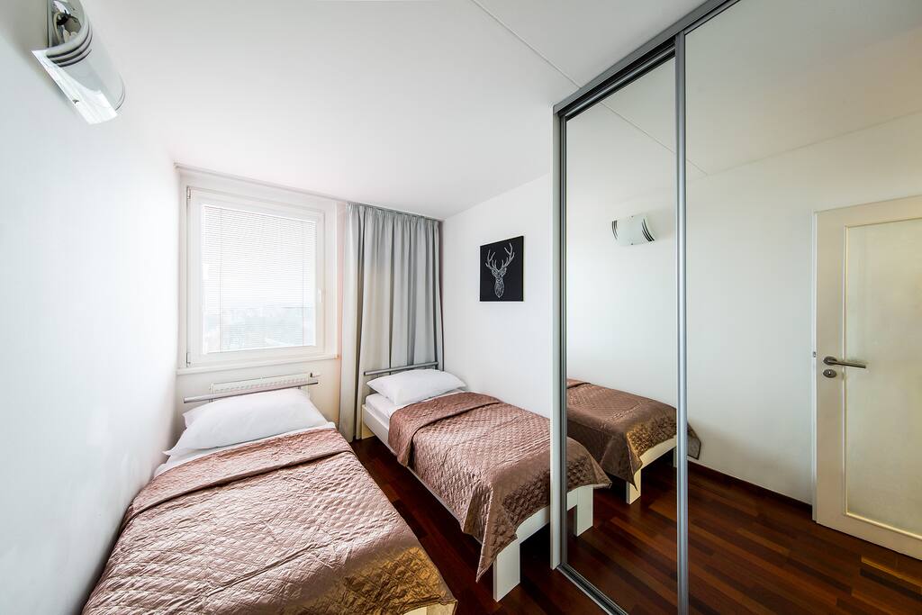 The second bedroom has two single beds, but, upon request, we can put them together :)
