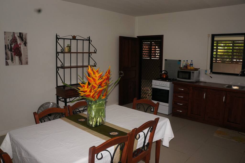 Entrance through dining and kitchen