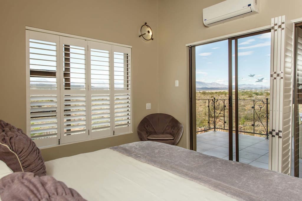 The room and the balcony. View over the veld and mountans. the