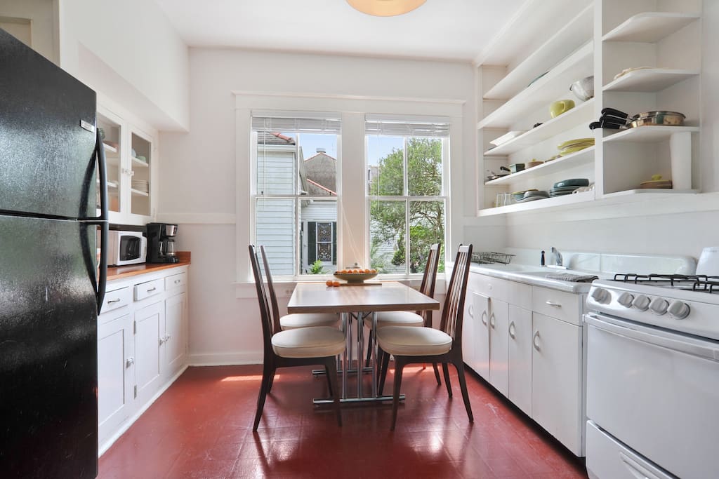 The kitchen has utensils and lots of dishes for your dining pleasure