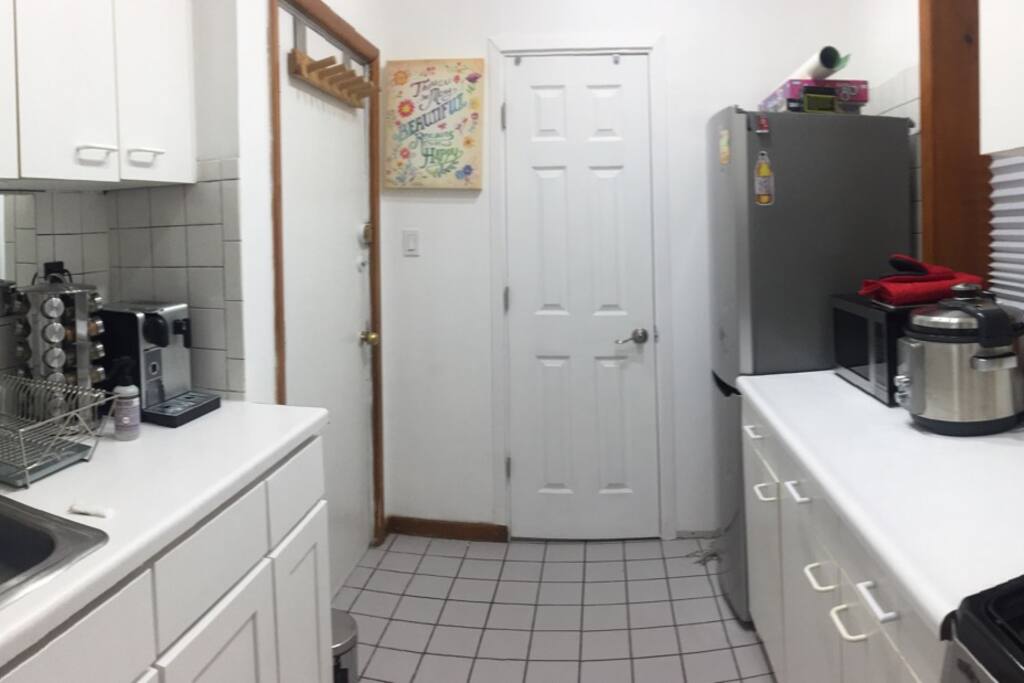 Fully functioning kitchen, microwave, espresso maker, oven.