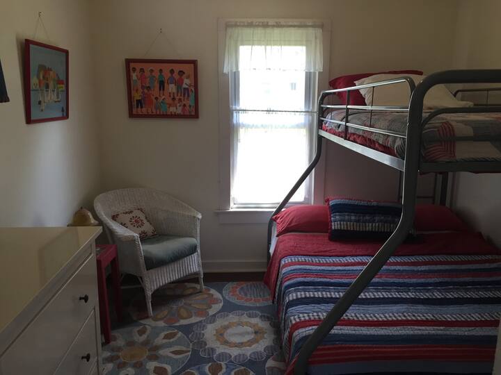 The second bedroom has a full bottom bunk with a twin on top.