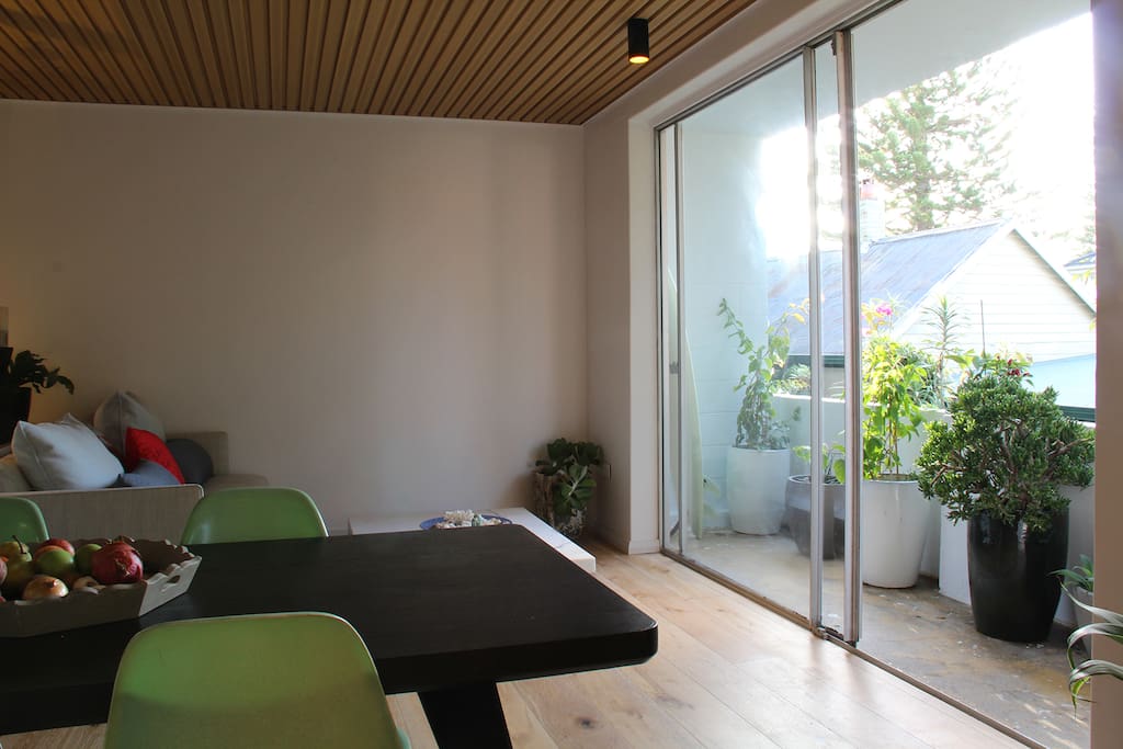 North facing balcony with full height glass sliding doors onto private leafy outlook
