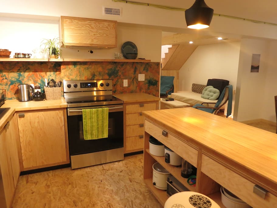 Looking from kitchen towards chill space under stairs.