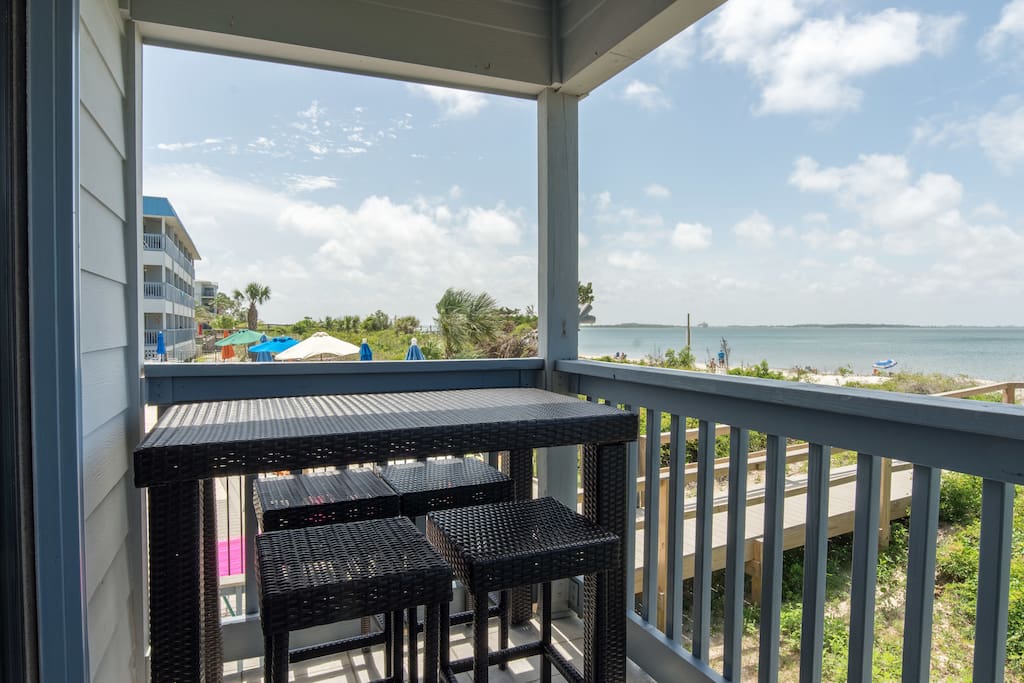 More views from the balcony. You can easily see the entire pool area from this unit. On the balcony are a counter height table for 4