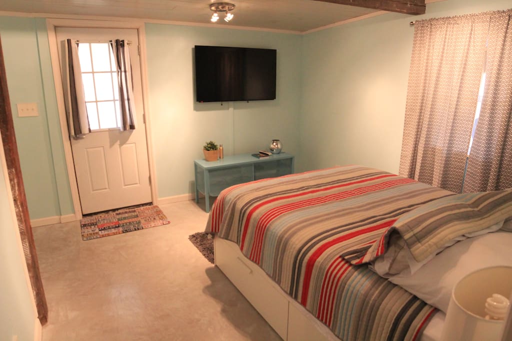 50" TV and DirecTV services, including WiFi. This view is from the entrance to the very spacious bathroom!