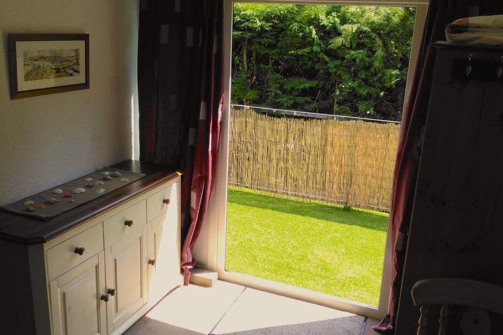 Double doors to private balcony.