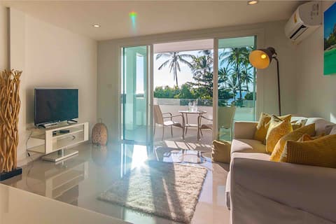 Modern 2-bed by beach. Pool. Sea & sunset views