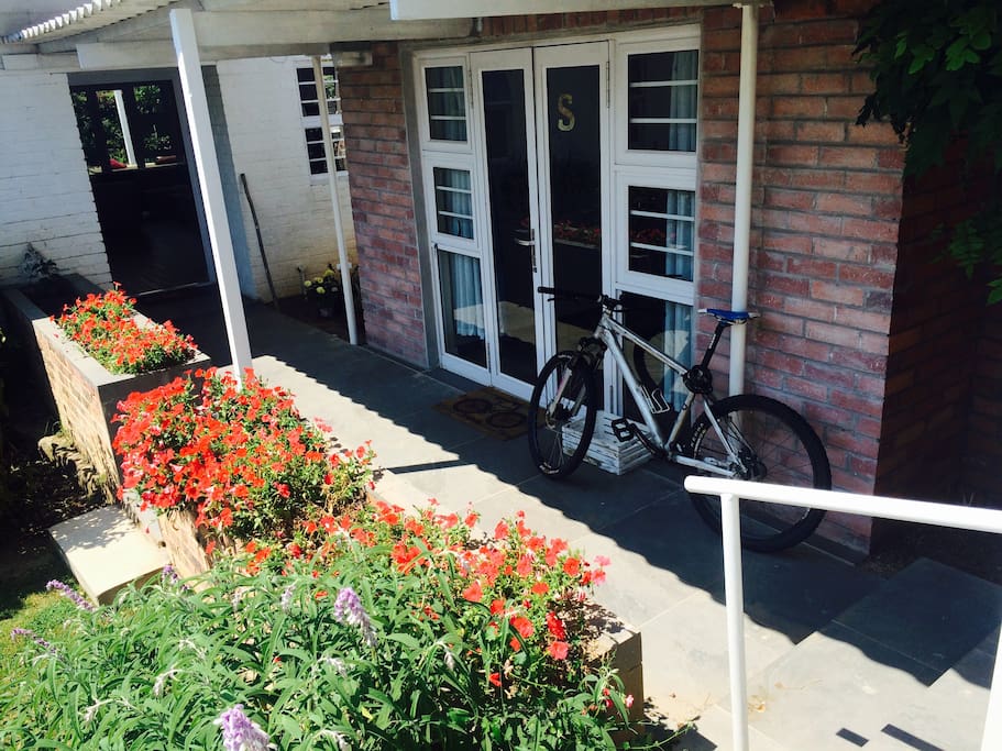 Glass double-doors provide light while main door is just 2m away