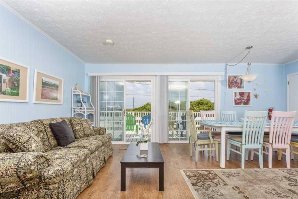 Direct access to the balcony from living area - What's better than being able to wake up from a cat nap on the plush sofa and wal