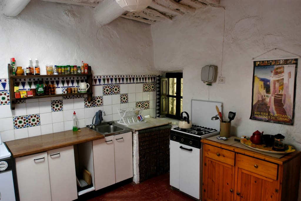 Rustic but well equipped kitchen.