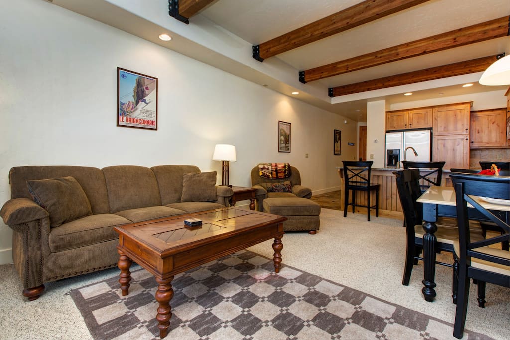 Open concept floor plan with exposed beam ceilings.